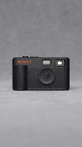 MOMNT Midnight — schermloze digitale camera in zwart