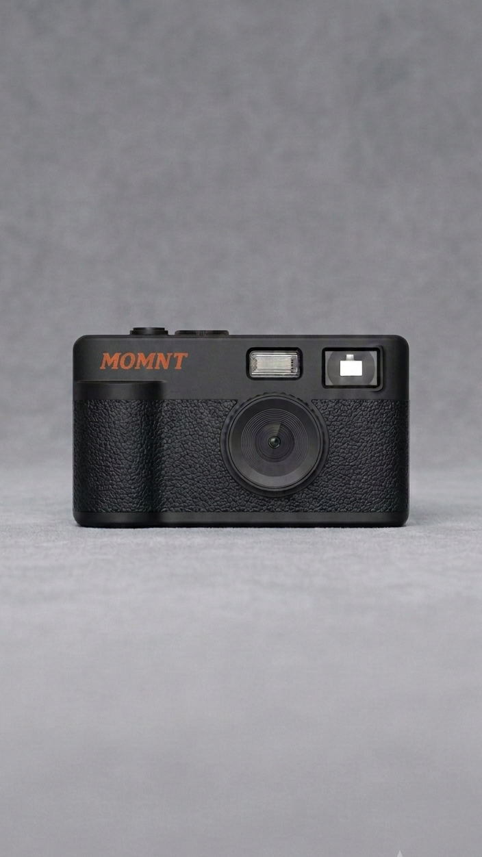 MOMNT Midnight — schermloze digitale camera in zwart