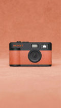 MOMNT Sunset — schermloze digitale camera in oranje