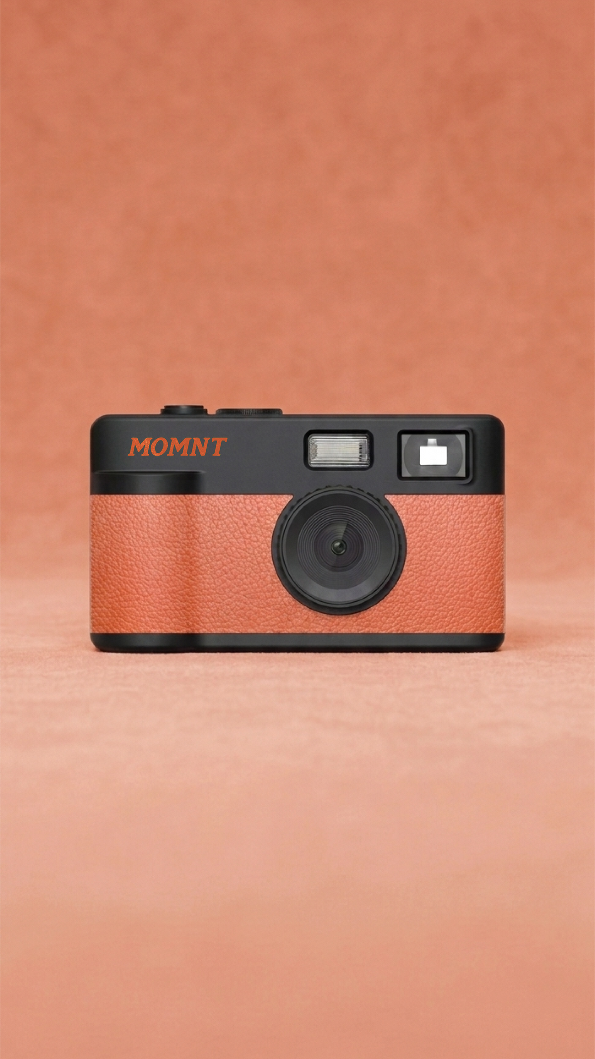 MOMNT Sunset — schermloze digitale camera in oranje